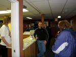 Crisis planning team head Mike Brawner (center), Stedman Elementary Principal Erica Kludt-Painter (left) and other school and city officials discuss the lockdown drill.