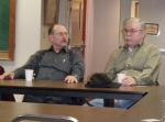 Wrangell Mayor Don McConachie and Petersburg Mayor Al Dwyer listen to the discussion over hydro-electric power development in Petersburg's city council chambers Thursday.