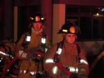 Junior firefighters Asa Aulbach and Lauren Yeager out on a drill.